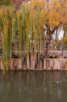 traditional watermill structure surrounded by trees in Tomar, Portugal