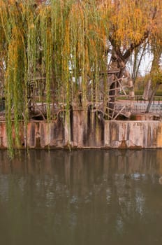 traditional watermill structure surrounded by trees in Tomar, Portugal