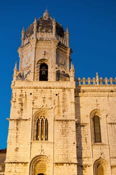 famous Hieronymites Monastery (Mosteiro dos Jeronimos) UNESCO World Heritage Site in Lisbon, Portugal (sunset picture)