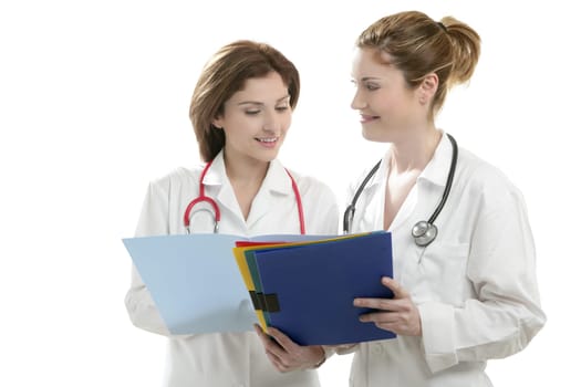 Two doctor women isolated on white studio background