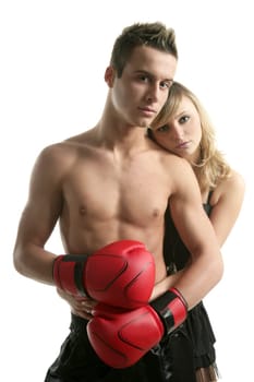 Sexy young male boxer with blond beautiful girl, isolated studio shot