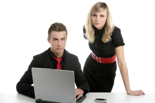 Young business couple dress in black with laptop isolated on white