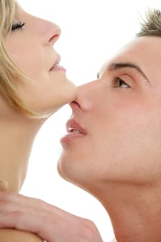 Kiss over white, young passion heterosexual couple