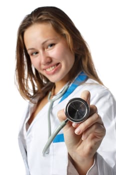 Smiling beautiful doctor with stethoscope on a  white background. Medical concept. Selective focus.