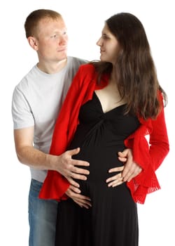 The happy pregnant woman with the husband on a white background.