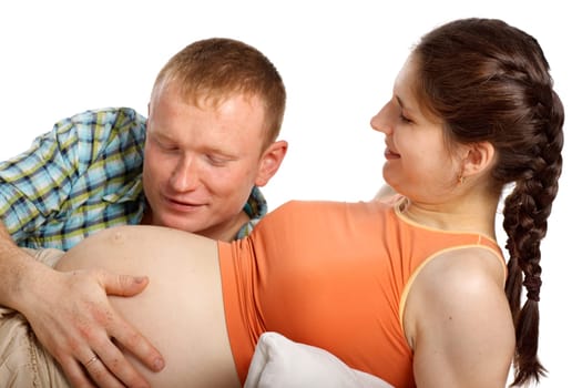 The happy pregnant woman with the husband on a white background.