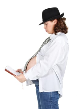 The pregnant woman in a shirt with a tie and a hat with a book in hands on a white background.
