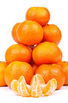 Fresh tangerines on a white background. Close up.