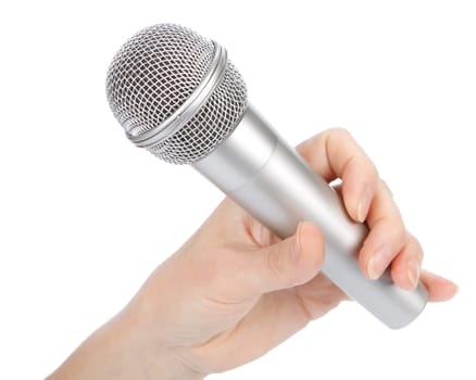 Silver microphone in a female hand on a white background.