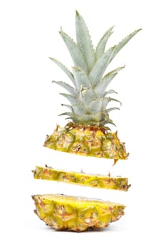 Fresh sliced pineapple on a white background. Close up.