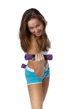 The beautiful sports girl with dumbbells on a white background. Training.