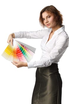 The beautiful girl with a color guide on a white background.