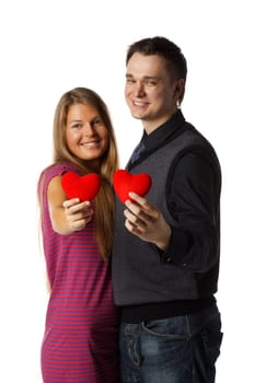 Young enamoured couple with a heart on a white background.