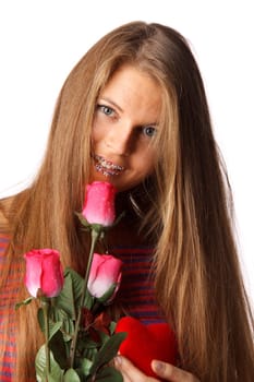 The beautiful girl with red heart and roses on a white background.