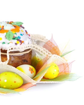 Easter cake and eggs on a white background