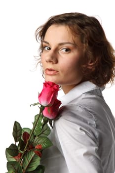 The beautiful girl with a bouquet of roses on a white background.
