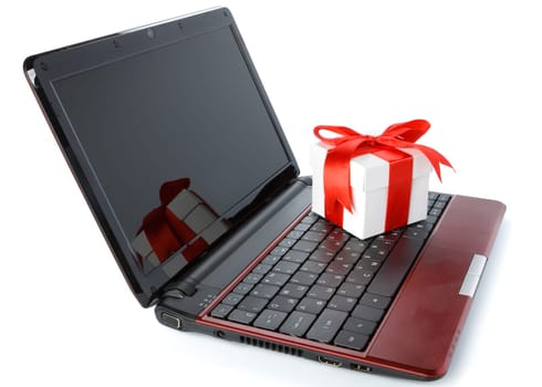 Modern notebook and gift box on a white background