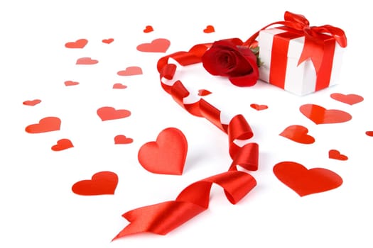 Gift box and rose on a white background. Valentine&#039 s day card.