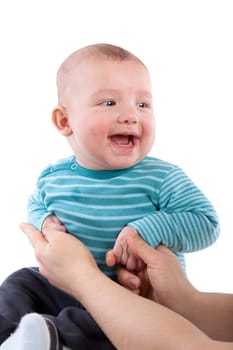 The nice small child in striped rompers on a white background.