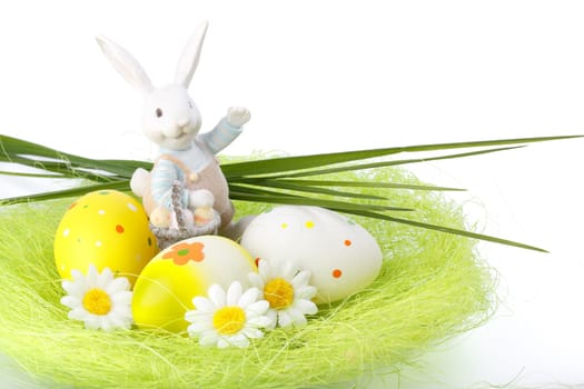 Decoration with various colorful easter eggs. Close up.