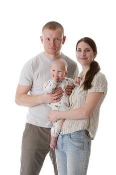 Happy family. Father, mother and sweet baby on a white background.