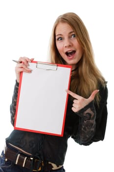 The beautiful girl stands with a clipboard and the pen in hands on a white background.