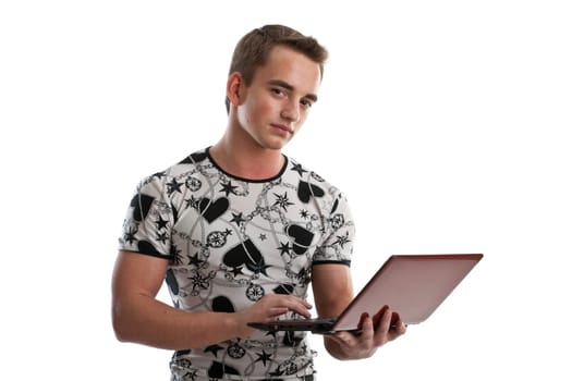 Student stands with the laptop on a white background.