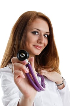 Smiling beautiful doctor with stethoscope on a white background. Medical concept.