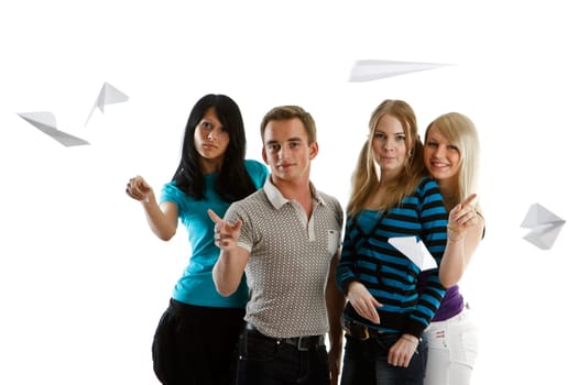 Group of young happy people with paper planes on a white background.