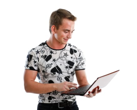 Student stands with the laptop on a white background.