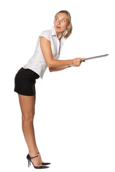 The beautiful blonde stands with a clipboard in hands on a white background.