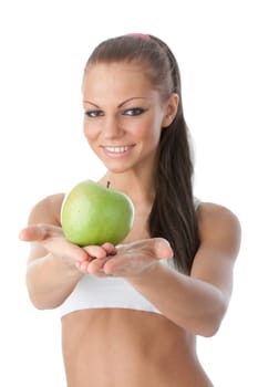 Young beautiful girl with apple in hands on a white background. Healthy food concept
