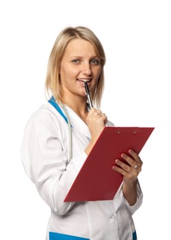Smiling medical doctor with stethoscope and clipboard on a white background. Medical concept.