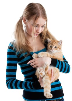The happy young woman with a small amusing kitten on a white background.