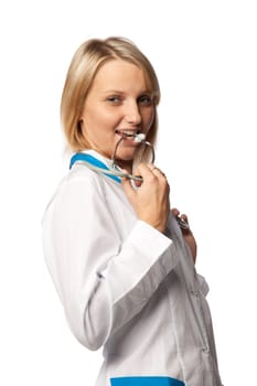 Smiling beautiful doctor with stethoscope on a white background. Medical concept.