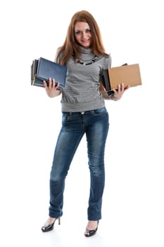 The attractive student stands with books on a white background. The student.