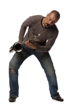 Man with saxophone on a white background