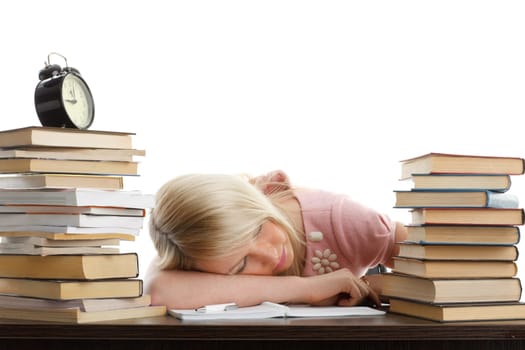 Stressed young woman sleeping at office desk