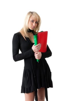 The beautiful woman stand with coloured folders on a white background.