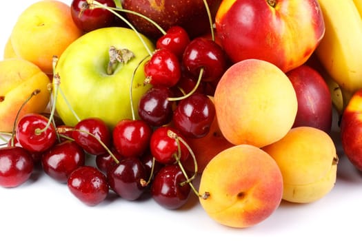 Fresh fruits on a white background. Close up.