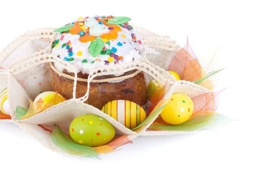 Easter cake and eggs on a white background