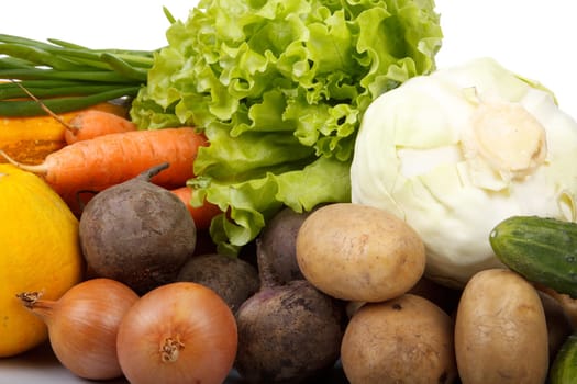 Abstract background from fresh vegetables on a white background.