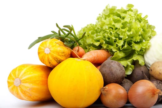 Abstract background from fresh vegetables on a white background.