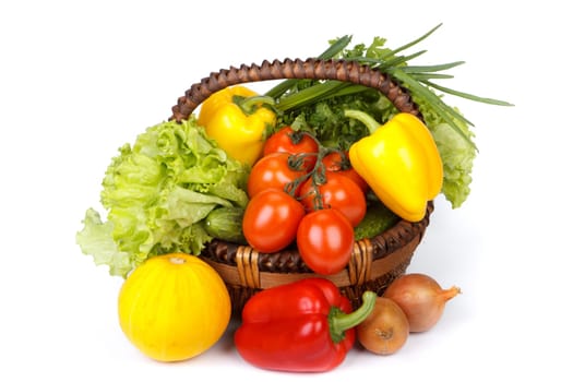 Still-life with fresh vegetables on a white background.