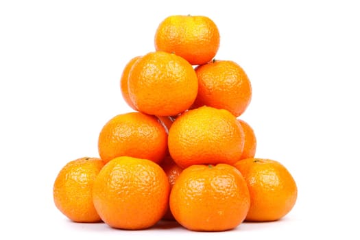 Fresh tangerines on a white background. Close up.