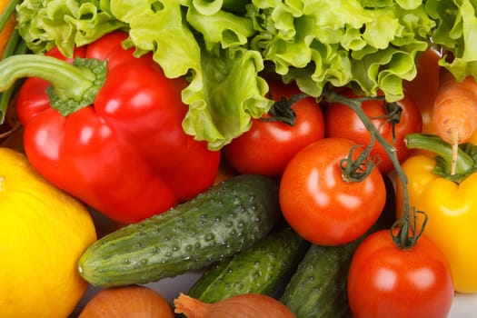 Abstract background from fresh vegetables on a white background.