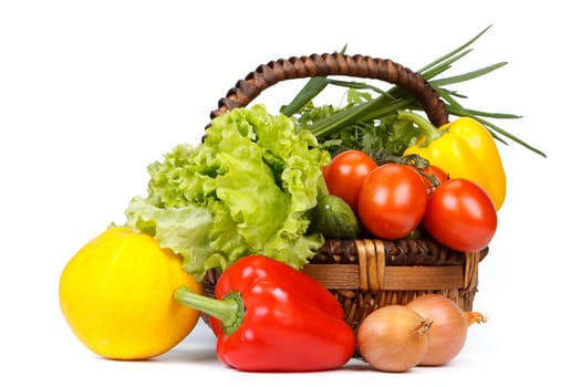 Still-life with fresh vegetables on a white background.