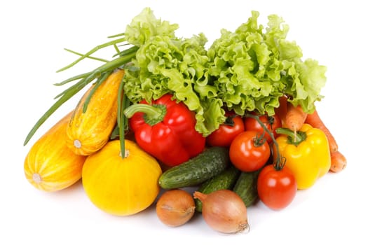 Still-life with fresh vegetables on a white background.