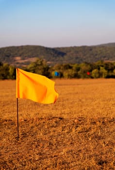 golf drive range in Mahabhaleshwar India, 100 meter colored flag markers, portrait, crop margin and empty negative areas