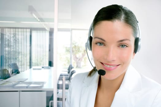 Headset phone business woman dress in white studio shot